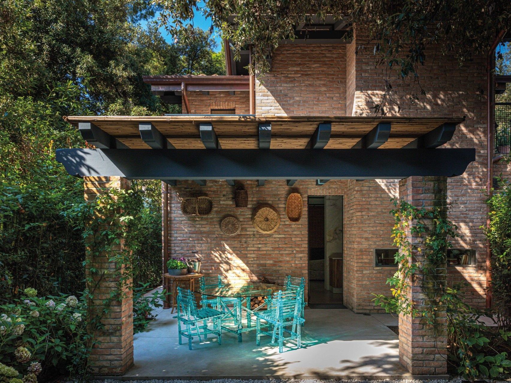 A'mare . The chairs and the dining table in the patio that gives on the kitchen.