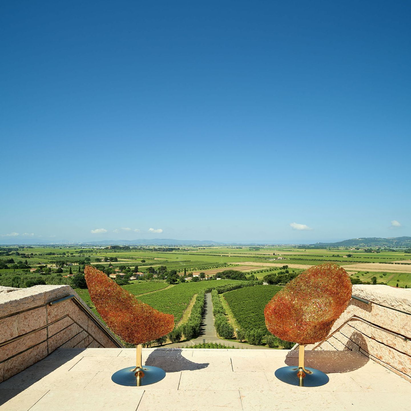  Margherita. The two armchairs at the top of the stairs dominate the landscape looking out to earth and sky 