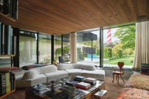   On the Rocks.  The sofa opens up a 360-degree view of the landscape in the villa’s living area. Artworks by Maarten Baas, Piet Hein Eek and Anton Gaudì. 