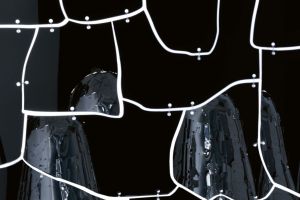  Miraggio. A detail of the mirror reflecting the Campana lamps. 