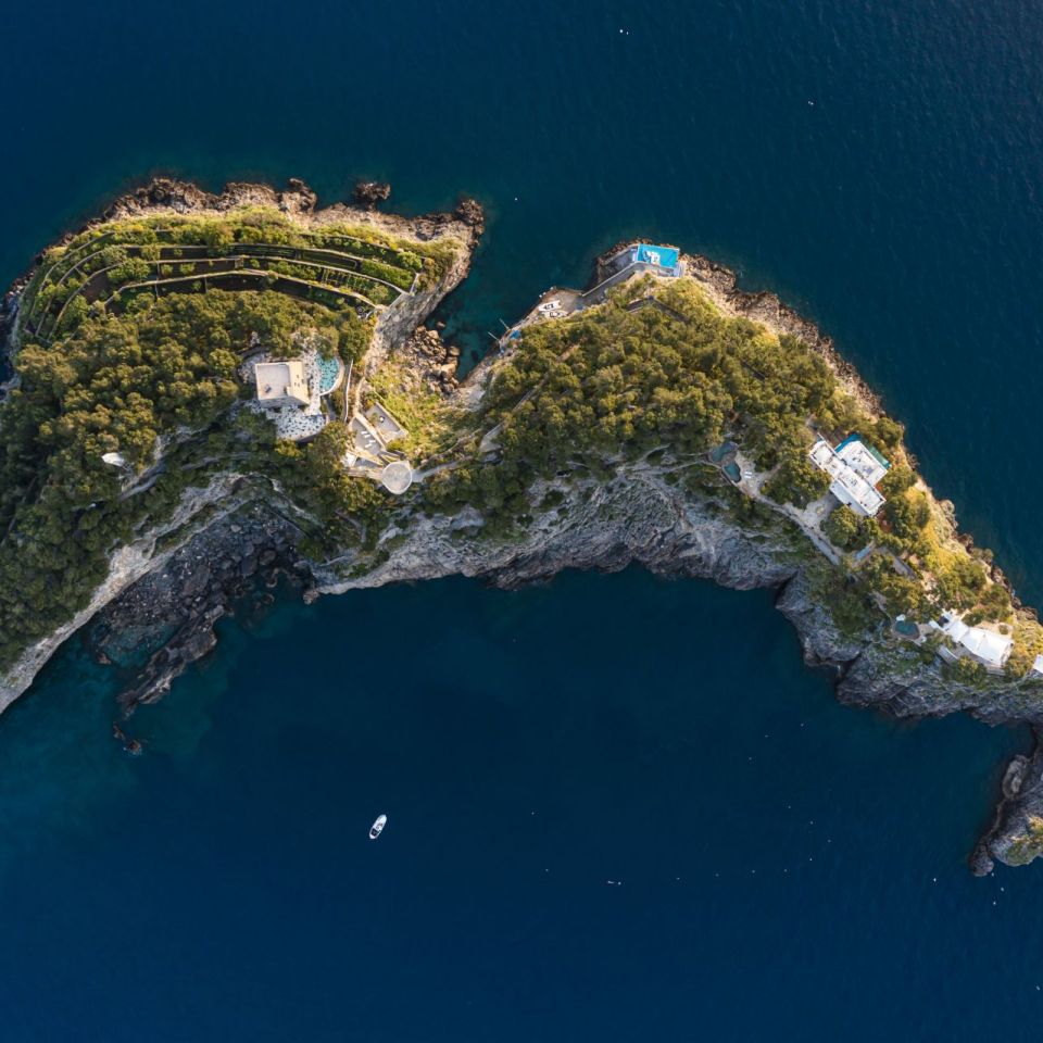  The Li Galli archipelago. Aerial view of the three islets called Gallo Lungo, the largest, with the silhouette of a dolphin, La Rotonda and La Castelluccia. 